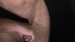 curly twink receives a handjob and played with a sextoy.