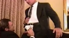 In a suit receives sloppy fucking