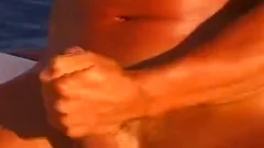 Muscle dude Masturbates On A Sail Boat