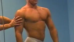 coach training his boy Flexing And Posing