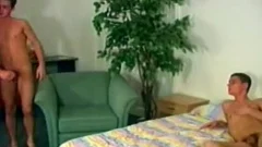 Three adorable youthful homosexuals In bed