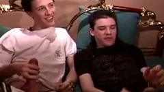 Three Schoolboy-friends blowing Each Other