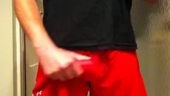 giant penis in Red Shorts