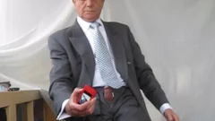 jerk offING IN SUIT AND TIE