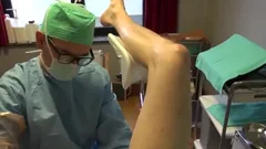 25yo Male Patient gets Fisting Initiation By Surgeon On The Examination Table.