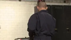 Janitor bounds man In Locker Room