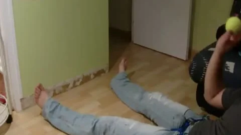 ballbusting game with tennis ball in jeans