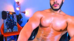 attractive Brown man Showing His Pectorals And His gigantic weenie
