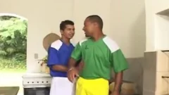 Two darksome Athletes Take Turns sucking weenie