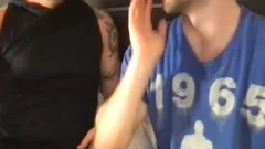 Two fashionable males giving a kiss And Touching Each Other's weenies