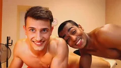 Interracial pair caresses Each Other
