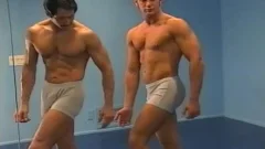 coach training his boy Flexing And Posing
