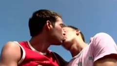 excited gay twinks sucking pecker outdoors By The Ocean