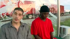 White guy pounding A darksome Thug