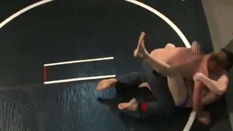 Two homosexual Wrestling And Getting in nature's garb In The Ring