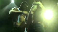 Suited men Having Sex On Stage