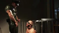 Muscled homosexual Spunks Caged